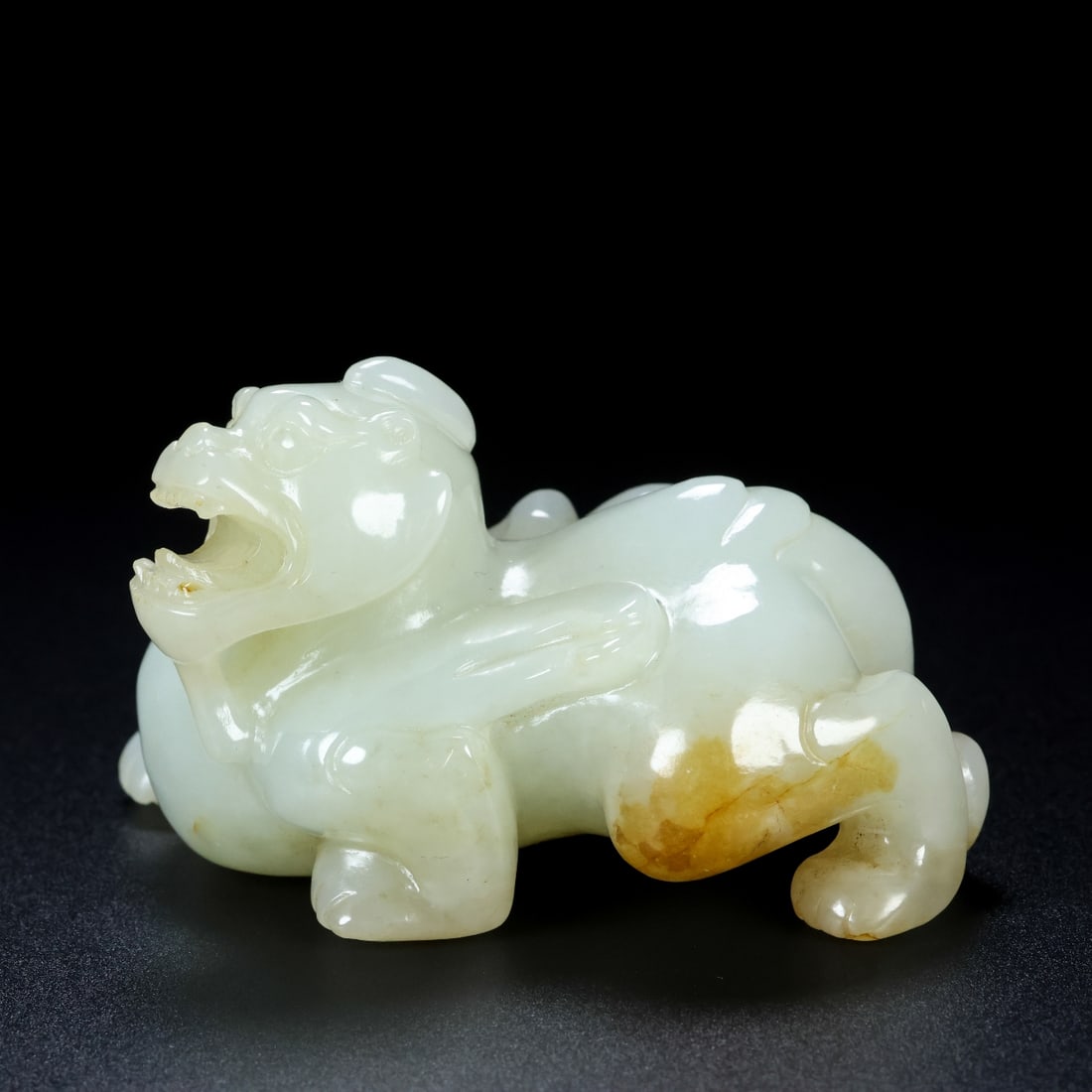 An Exquisite Hotan Jade Auspicious Beast Ornament: An Exquisite Hotan Jade Auspicious Beast Ornament,Qing Dynasty, China,Size:3.1inx2inx2in,Weight:174g 和田玉瑞兽摆件,中国清代