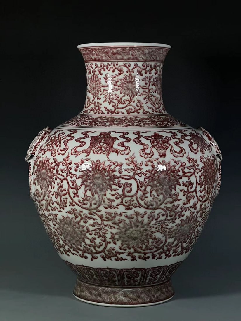 An Exquisite Underglaze-Red Lotus Pattern Vase: An Exquisite Underglaze-Red Lotus Pattern Vase,Qing Dynasty, China,Qianlong Six-character Mark,Size:20.3inx7.4inx8.3in 釉里红缠枝莲纹瓶,中国