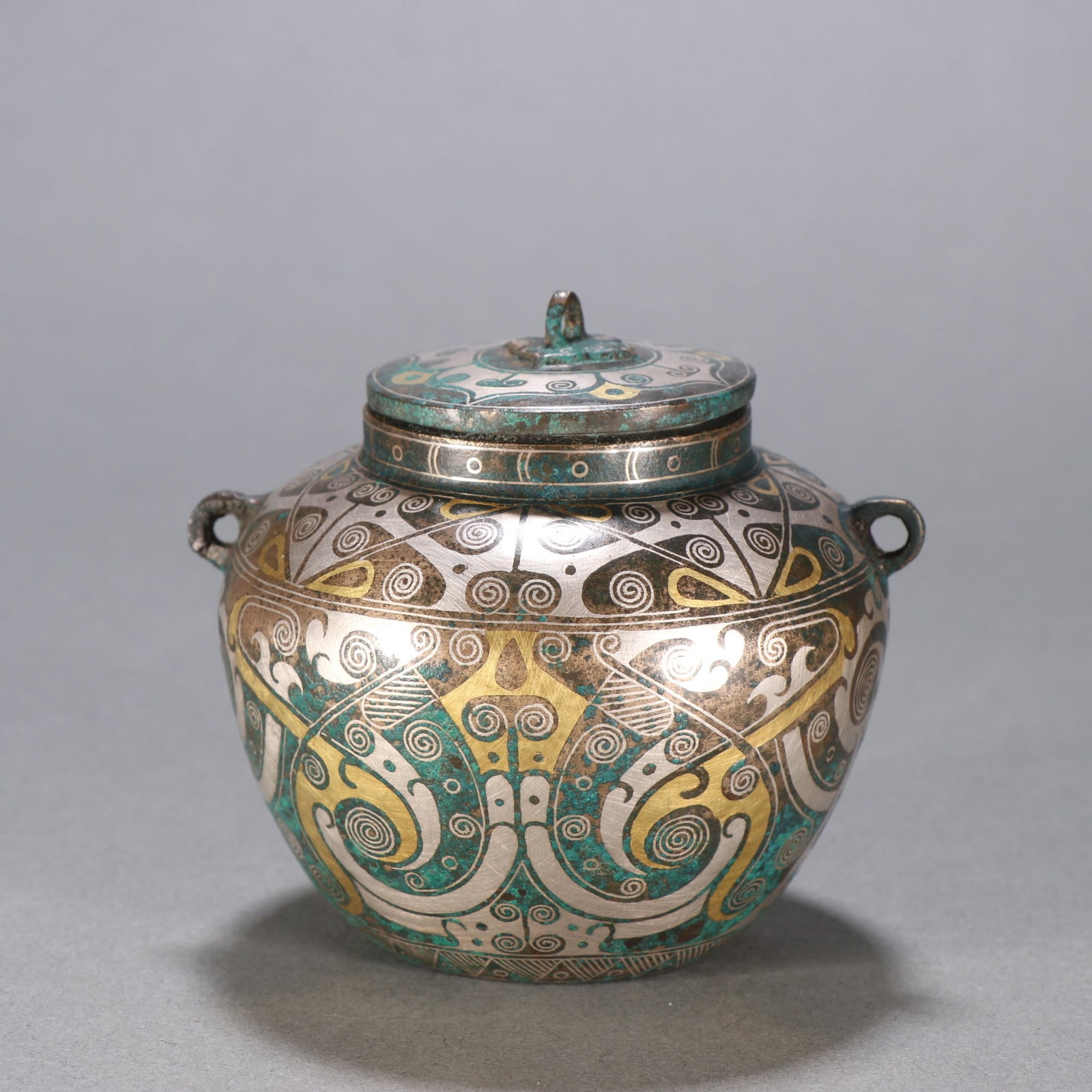 An Exquisite Gold and Silver-Inlaid Bronze Double-Ears Jar: An Exquisite Gold and Silver-Inlaid Bronze Double-Ears Jar,Han Dynasty, China,Size:2.8inx3.1in,Weight:333.8g 铜错金银双耳罐,中国汉代