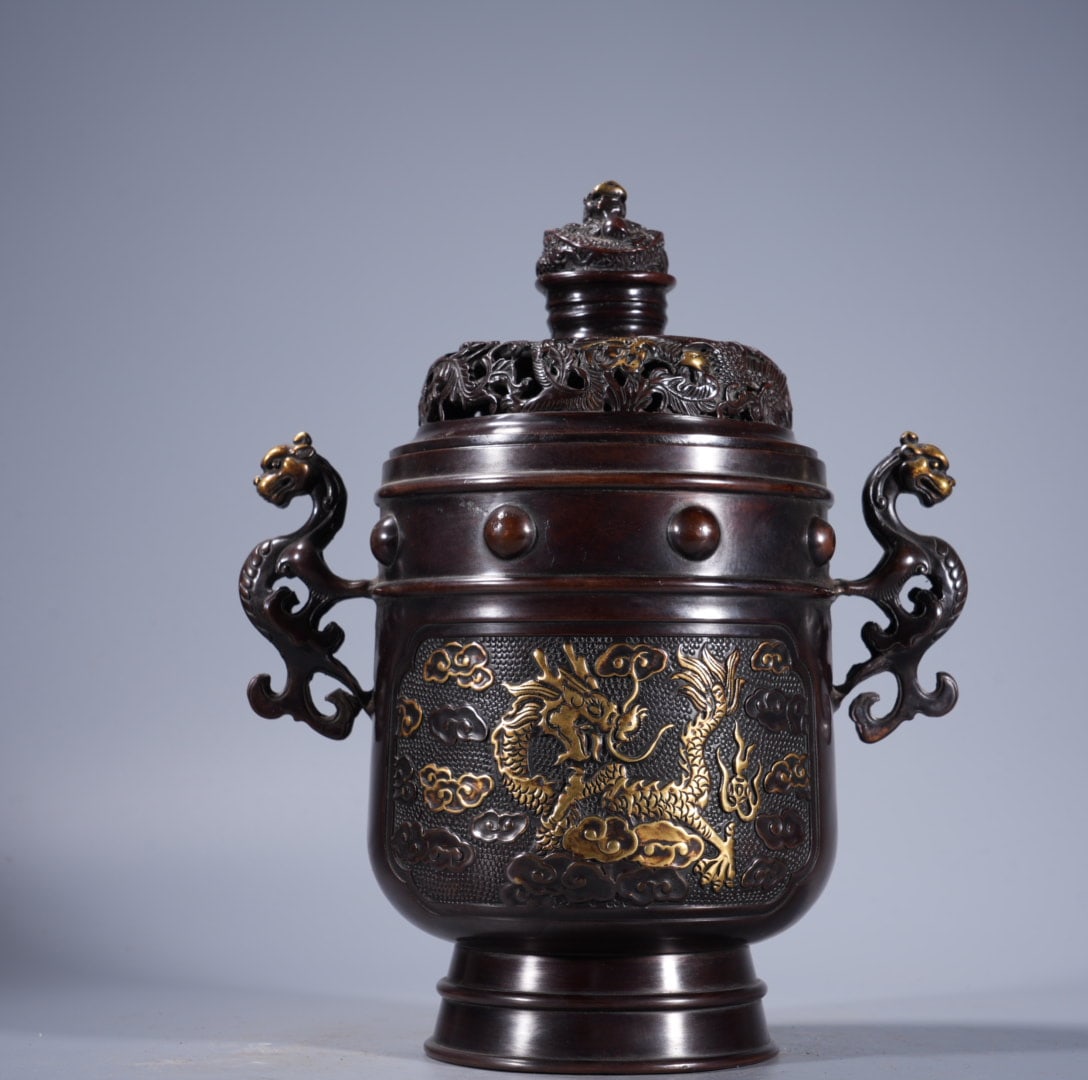 An Exquisite Gilt Bronze Relief Beast-Ears Censer: An Exquisite Gilt Bronze Relief Beast-Ears Censer,Ming Dynasty, China,Xuande Four-character Mark,Size:9.1inx4.6in ,Weight:3535g