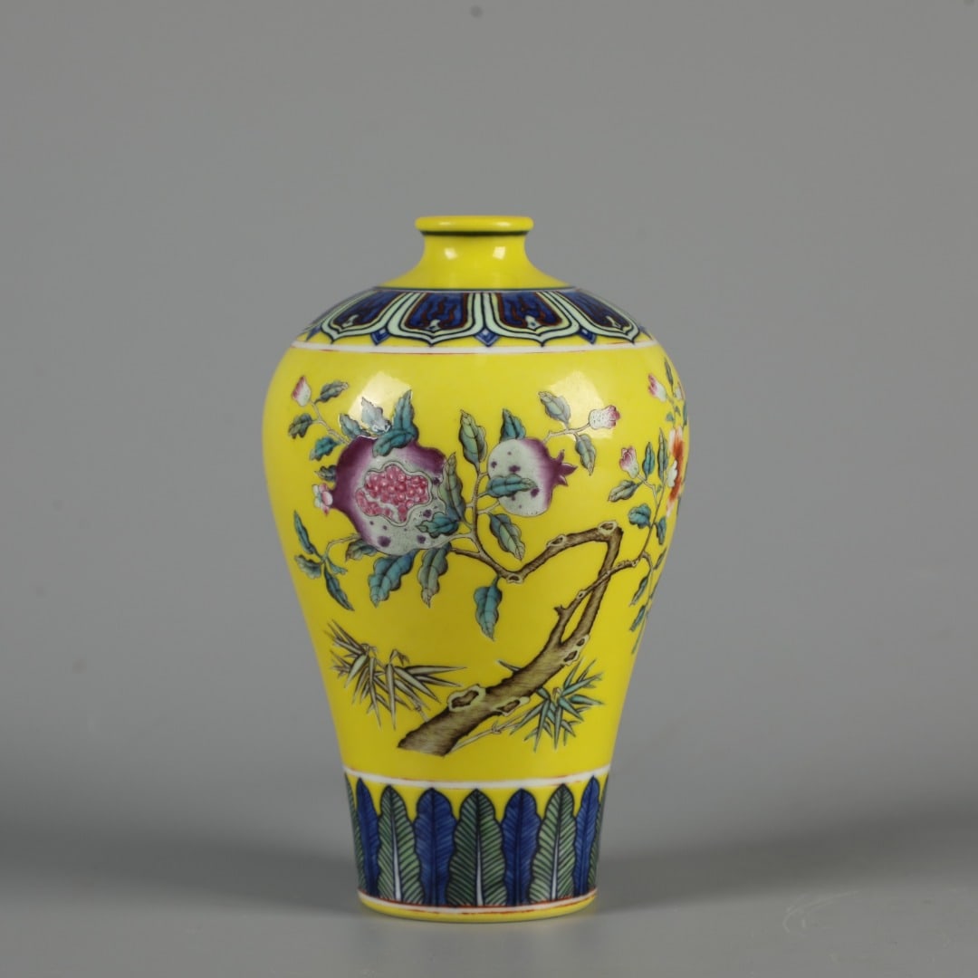 An Exquisite Yellow Glazed Pomegranate Pattern Vase: An Exquisite Yellow Glazed Pomegranate Pattern Vase,Qing Dynasty, China,Qianlong Six-character Mark,Size:6.7inx3.7in