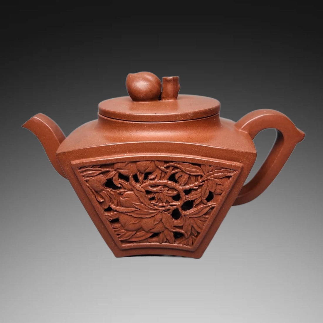 An Exquisite Purple Sands Peach Pattern Teapot: An Exquisite Purple Sands Peach Pattern Teapot,Republic of China,With Mark,Size:3.9inx5.1in 紫砂桃纹壶,民国,带款