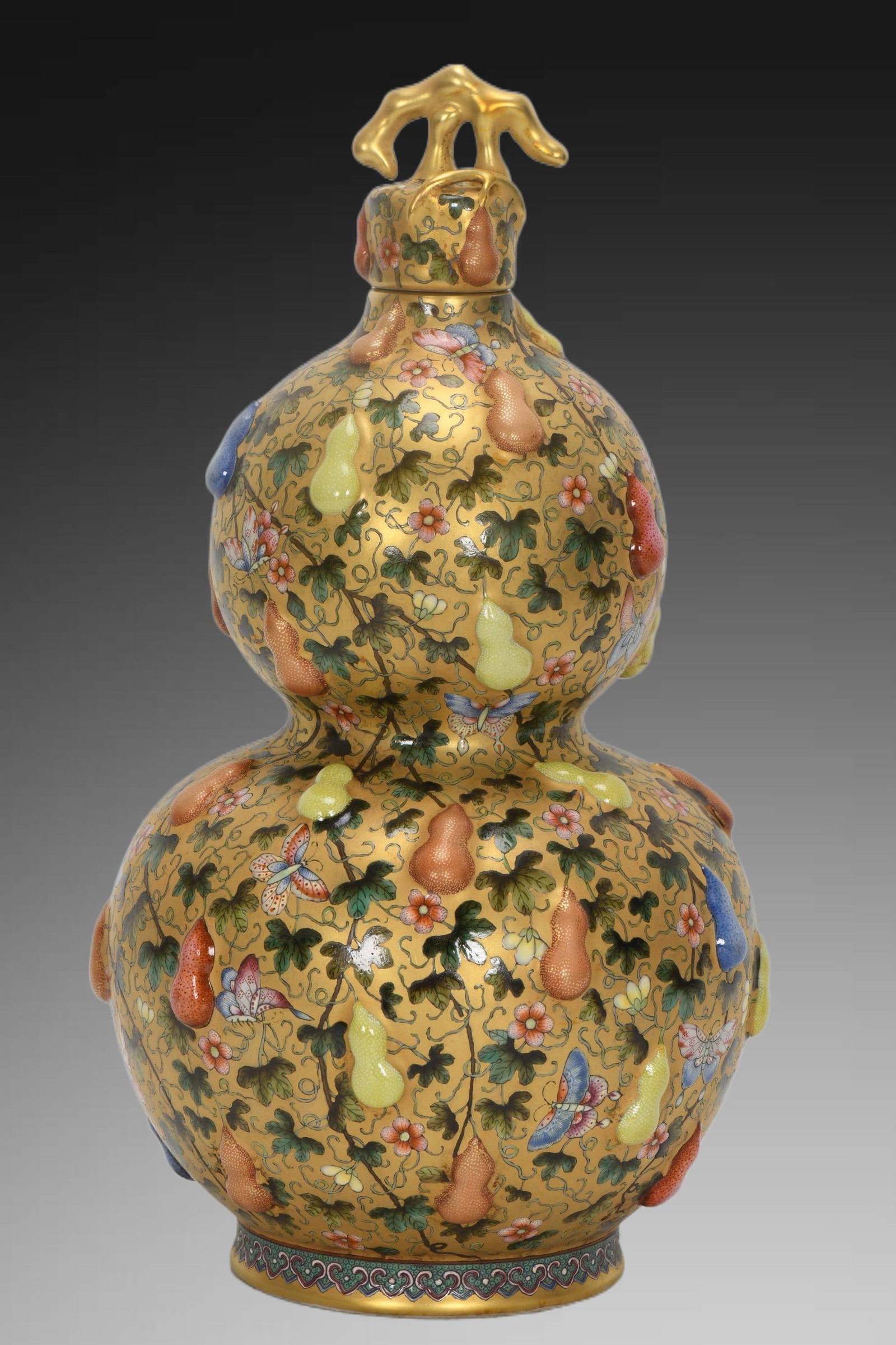 An Exquisite Enamel Gold Ground Gourd Vase: An Exquisite Enamel Gold Ground Gourd Vase,Qing Dynasty, China,Qianlong Four-character Mark,Size:11.8inx1.4inx6.4inx3.8in