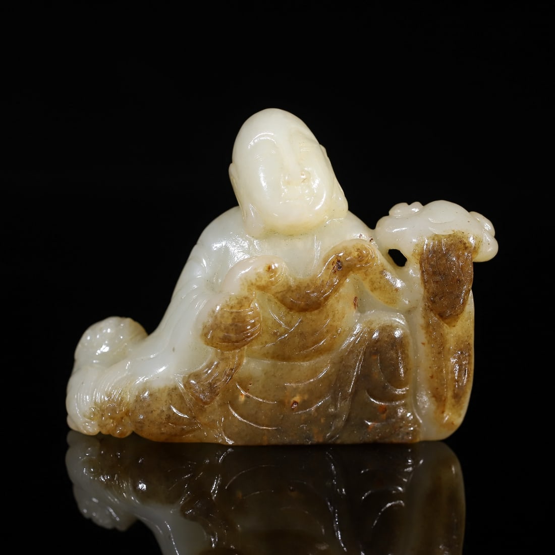 An Exquisite Hotan Jade Arhat Ornament: An Exquisite Hotan Jade Arhat Ornament,Qing Dynasty, China,Size:2.8inx0.9inx2.3in,Weight:98.2g 和田玉罗汉摆件,中国清代