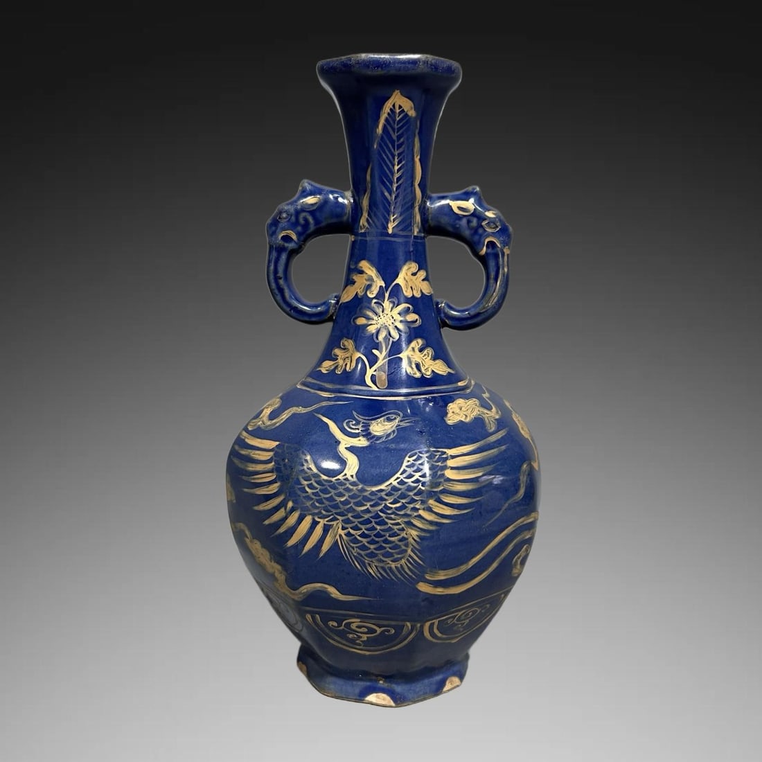 An Exquisite Blue Ground Painted Gold Phoenix Pattern Elephant-Ears Vase: An Exquisite Blue Ground Painted Gold Phoenix Pattern Elephant-Ears Vase,Qing Dynasty, China,Size:4.3inx10in 蓝地描金凤纹象耳瓶,中国&#