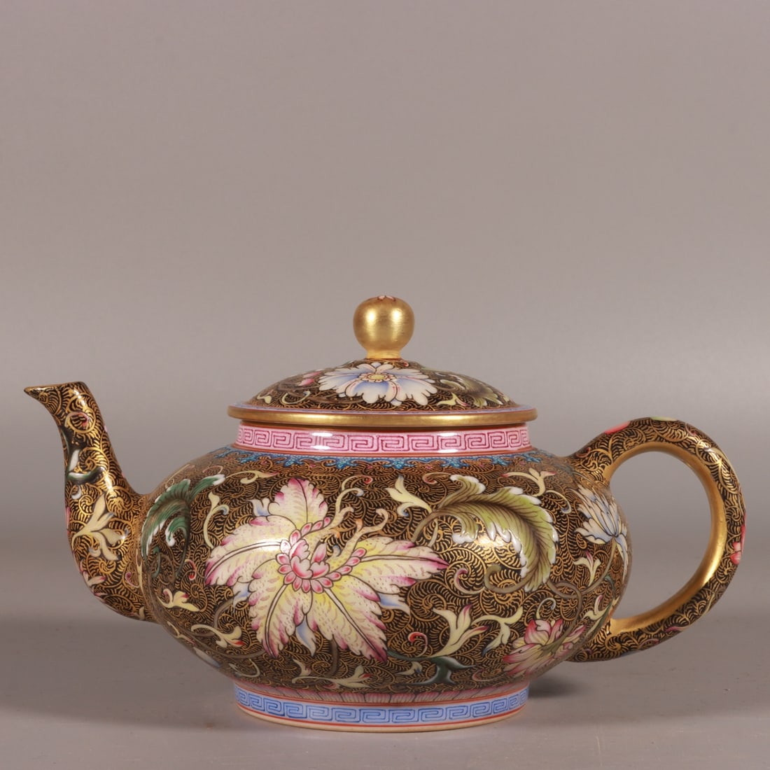 An Exquisite Enamel Black Ground Painted Gold Lotus Pattern Ewer: An Exquisite Enamel Black Ground Painted Gold Lotus Pattern Ewer,Qing Dynasty, China,Qianlong Six-character Mark,Size:4.1inx4.7in 珐琅彩黑地描金缠ੜ