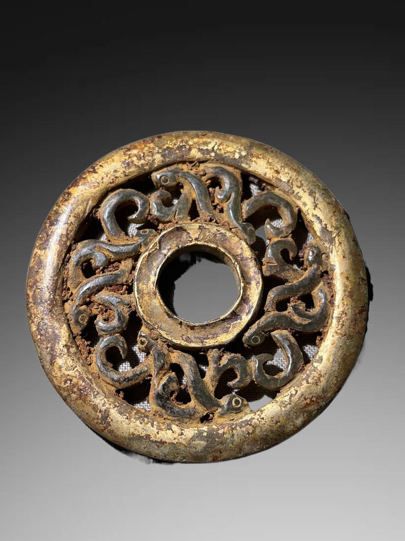 An Exquisite Hotan Jade Gilt Dragon Pattern Bi: An Exquisite Hotan Jade Gilt Dragon Pattern Bi,Han Dynasty, China,Size:2.9inx0.2in,Weight:60.9g 和田玉鎏金龙纹玉璧,中国汉代