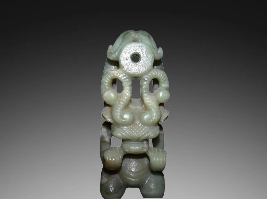 An Exquisite Hotan Jade Auspicious Beast Ornament: An Exquisite Hotan Jade Auspicious Beast Ornament,Ancient Time,China,Size:8.3inx3.9in,Weight:1150g 和田玉瑞兽摆件,远古时期