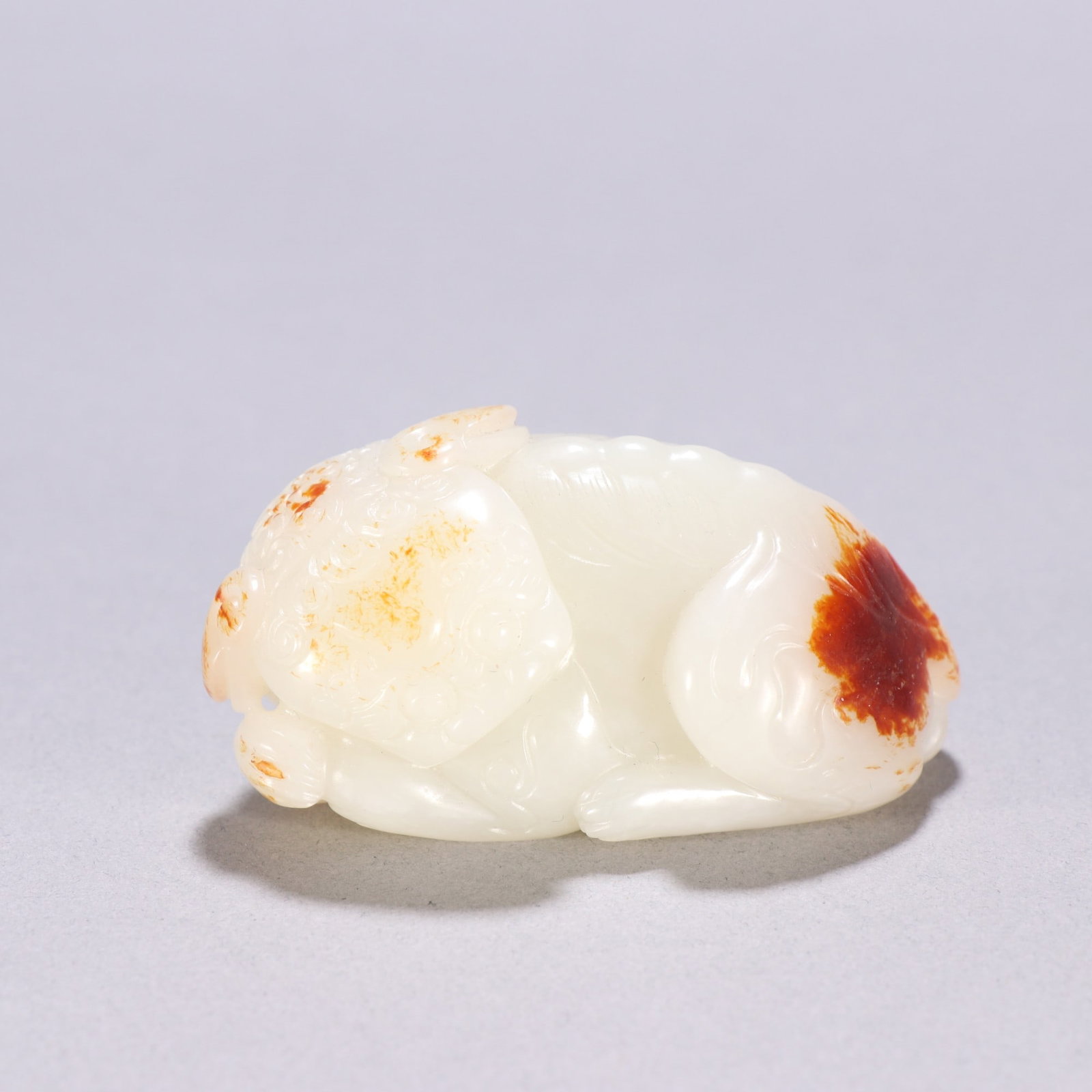 An Exquisite Hotan Jade Auspicious Beast Carving: An Exquisite Hotan Jade Auspicious Beast Carving, Qing Dynasty, China,Size:1.3inx2.7in ,Weight:144g 和田玉瑞兽雕件, 中国清代