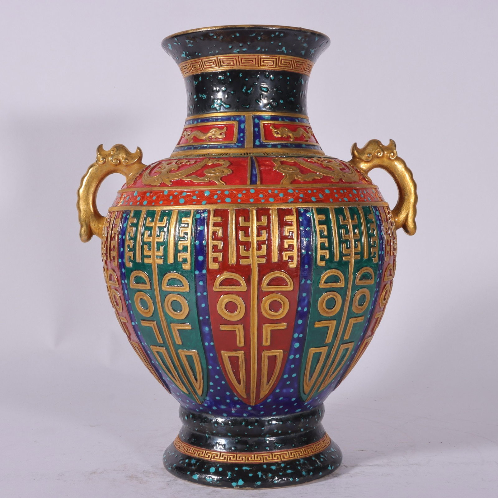 An Exquisite Antique Bronze Glaze Painted Gold Double-Ears Vase: An Exquisite Antique Bronze Glaze Painted Gold Double-Ears Vase,Qing Dynasty, China,Qianlong Six-character Mark,Size:11.8inx7.9in 古铜彩描金双耳瓶,È