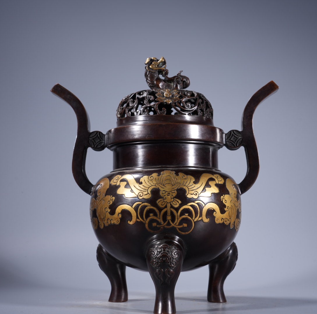 An Exquisite Gold-Inlaid Bronze Double-Ears Censer: An Exquisite Gold-Inlaid Bronze Double-Ears Censer,Ming Dynasty, China,Xuande Six-character Mark,Size:10.2inx4.8in ,Weight:4335g