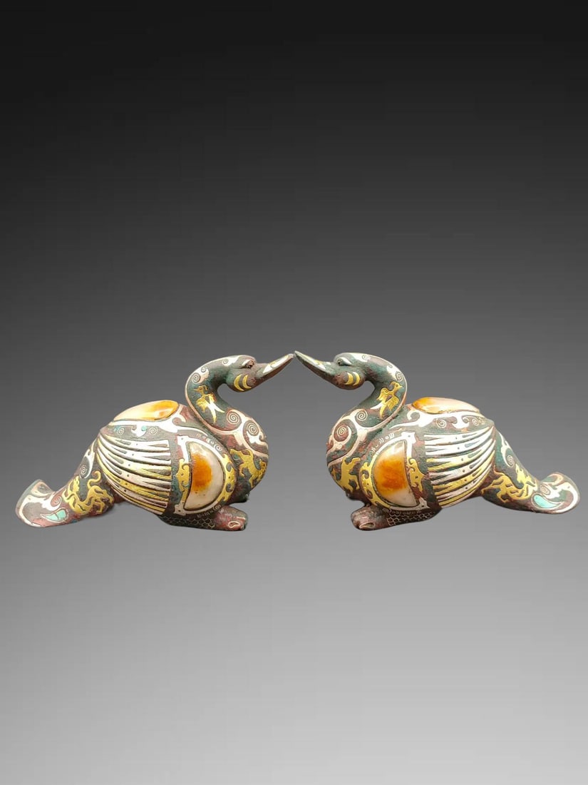 A pair of Exquisite Bronze Gold and Silver-Inlaid Jade Inlaid Bird-Shaped Ornaments: A pair of Exquisite Bronze Gold and Silver-Inlaid Jade Inlaid Bird-Shaped Ornaments,Han Dynasty, China,Size:6.3inx3.3in,Weight:g 一对铜错金银嵌玉鸟