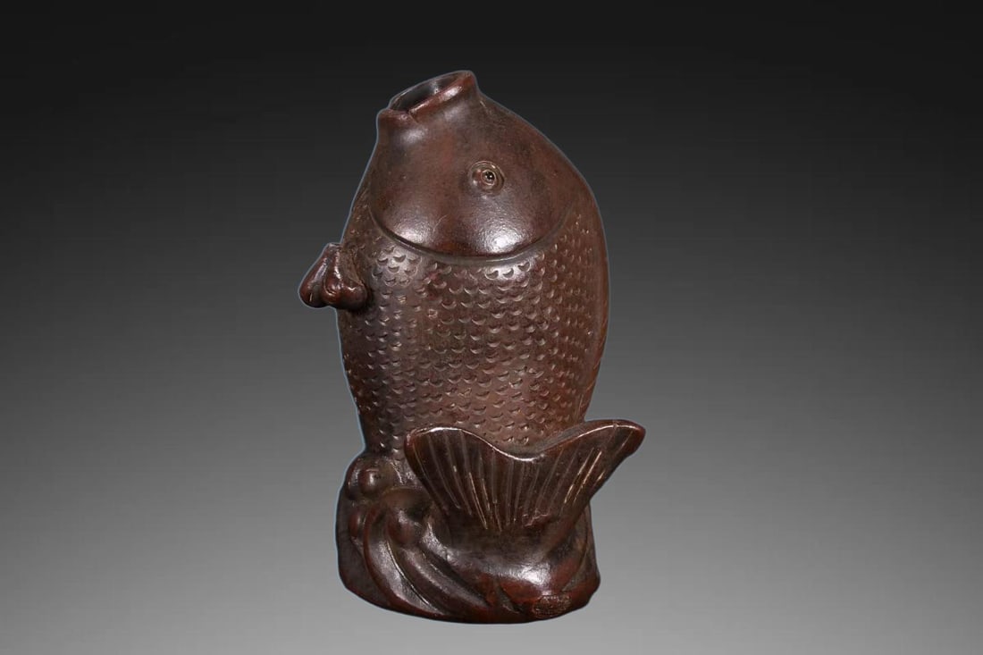An Exquisite Purple Sands Fish Vase: An Exquisite Purple Sands Fish Vase,Qing Dynasty, China,Size:2.4inx2inx4.1in 紫砂鱼瓶,中国清代