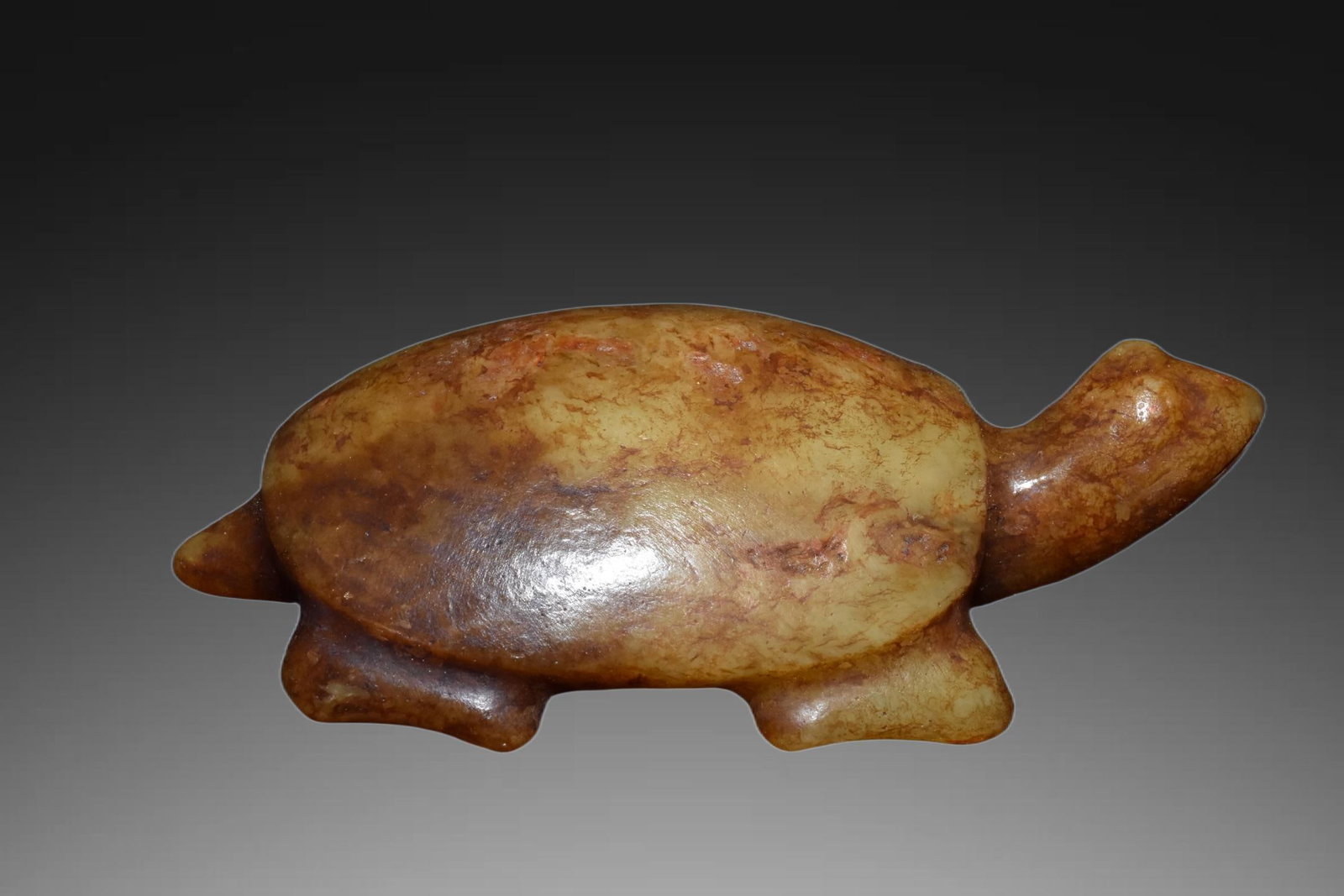 An Exquisite Hemoyu Jade Tortoise: An Exquisite Hemoyu Jade Tortoise,Ancient Time,China,Size:2.2inx3.9in,Weight:150g 河磨玉龟,远古时期