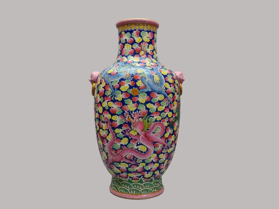 An Exquisite Ji Blue Glazed Ground Famille-Rose Painted Gold Dragon Pattern Beast-Ears Vase: An Exquisite Ji Blue Glazed Ground Famille-Rose Painted Gold Dragon Pattern Beast-Ears Vase,Qing Dynasty, China,Qianlong Six-character Mark,Size:13.4inx3.5inx7.5in 霁蓝地粉