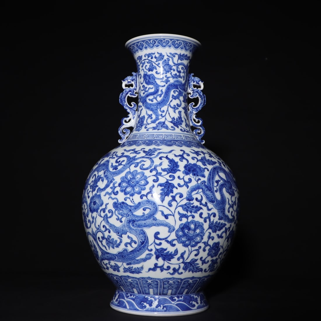 An Exquisite Blue and White Dragon Pattern Double-Ears Vase: An Exquisite Blue and White Dragon Pattern Double-Ears Vase,Qing Dynasty, China,Qianlong Six-character Mark,Size:15.4inx9.4in 青花龙纹双耳瓶,中国&