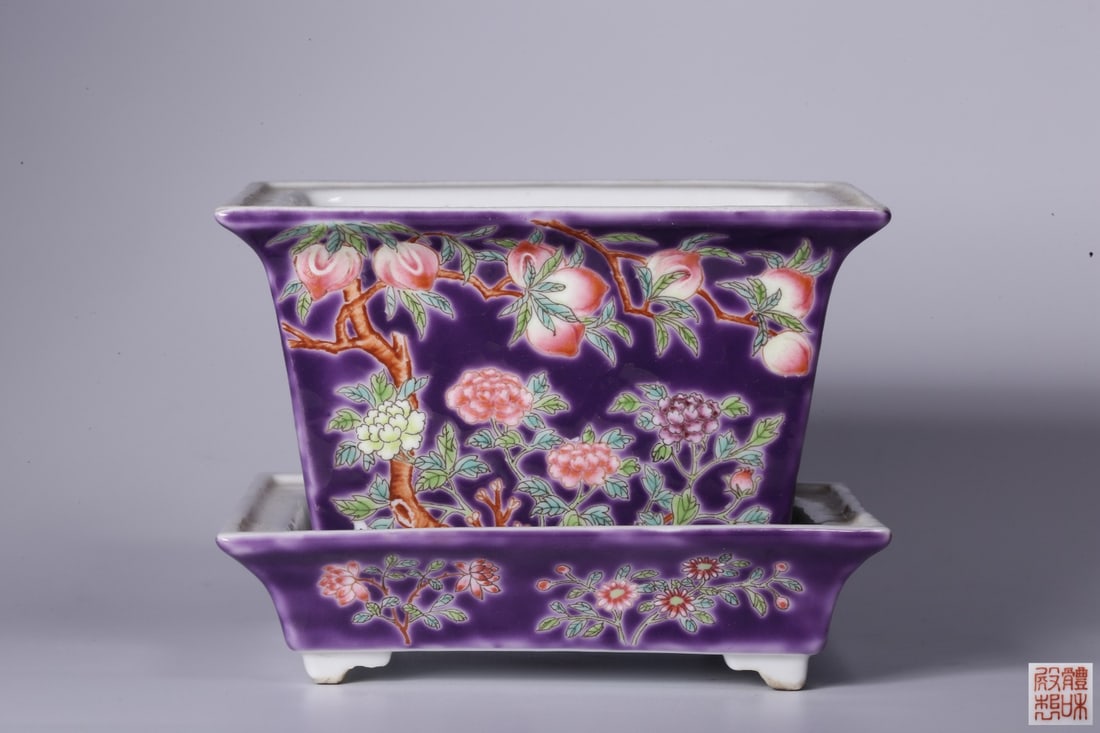 An Exquisite Purple Ground Famille-Rose Flower and Fruit Pattern Flowerpot: An Exquisite Purple Ground Famille-Rose Flower and Fruit Pattern Flowerpot,Qing Dynasty, China,With Mark,Size:3inx4.1inx3in,Weight:309g 紫地粉彩花果纹花