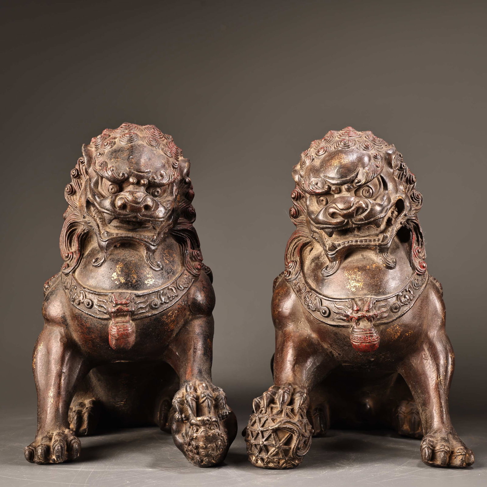 A pair of Exquisite Bronze Painted Color Lion Ornament: A pair of Exquisite Bronze Painted Color Lion Ornament,Qing Dynasty, China,Qianlong Four-character Mark,Size:9.8inx10.6in,Weigh:5000g 一对铜彩绘狮摆件,&