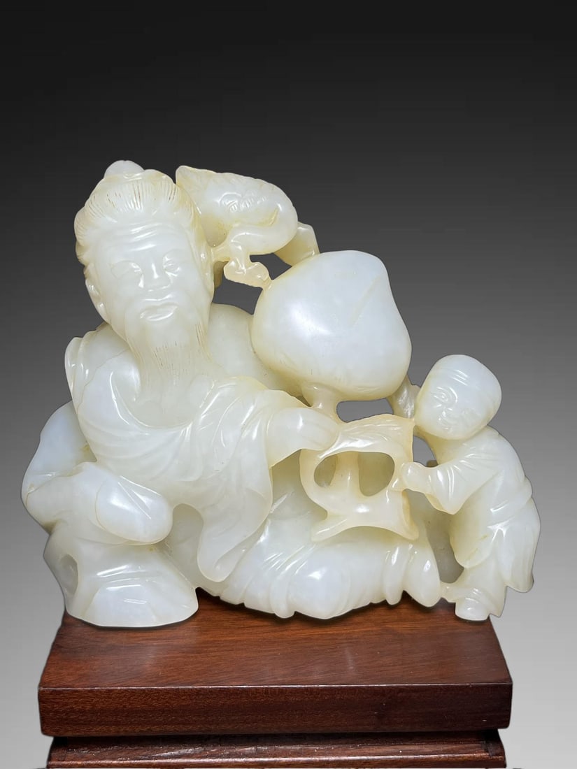 An Exquisite Hotan Jade Figures Ornament: An Exquisite Hotan Jade Figures Ornament,Qing Dynasty, China,Size:3.8inx1.5inx3.2in,Weight:288g 和田玉人摆件,中国清代