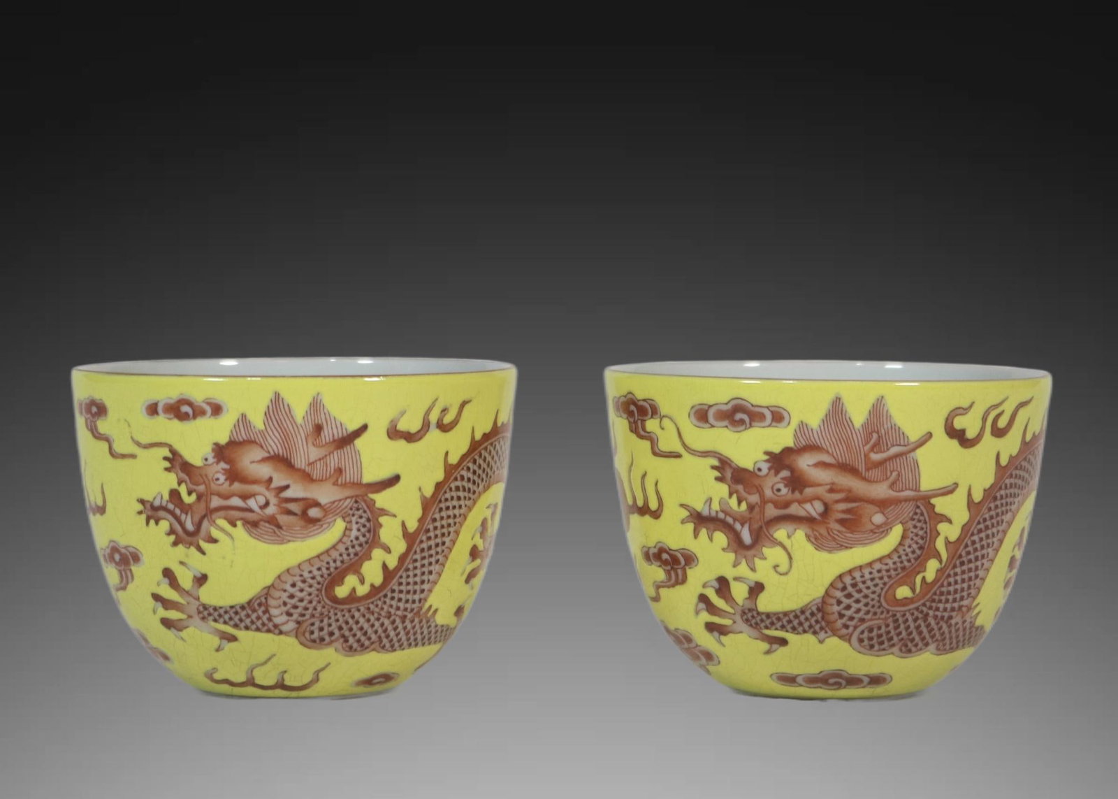 A pair of Exquisite Yellow Ground Iron-Red Dragon Pattern Cup: A pair of Exquisite Yellow Ground Iron-Red Dragon Pattern Cup,Qing Dynasty, China,Qianlong Four-character Mark,Size:1.9inx2.6in 一对黄地矾红龙纹杯