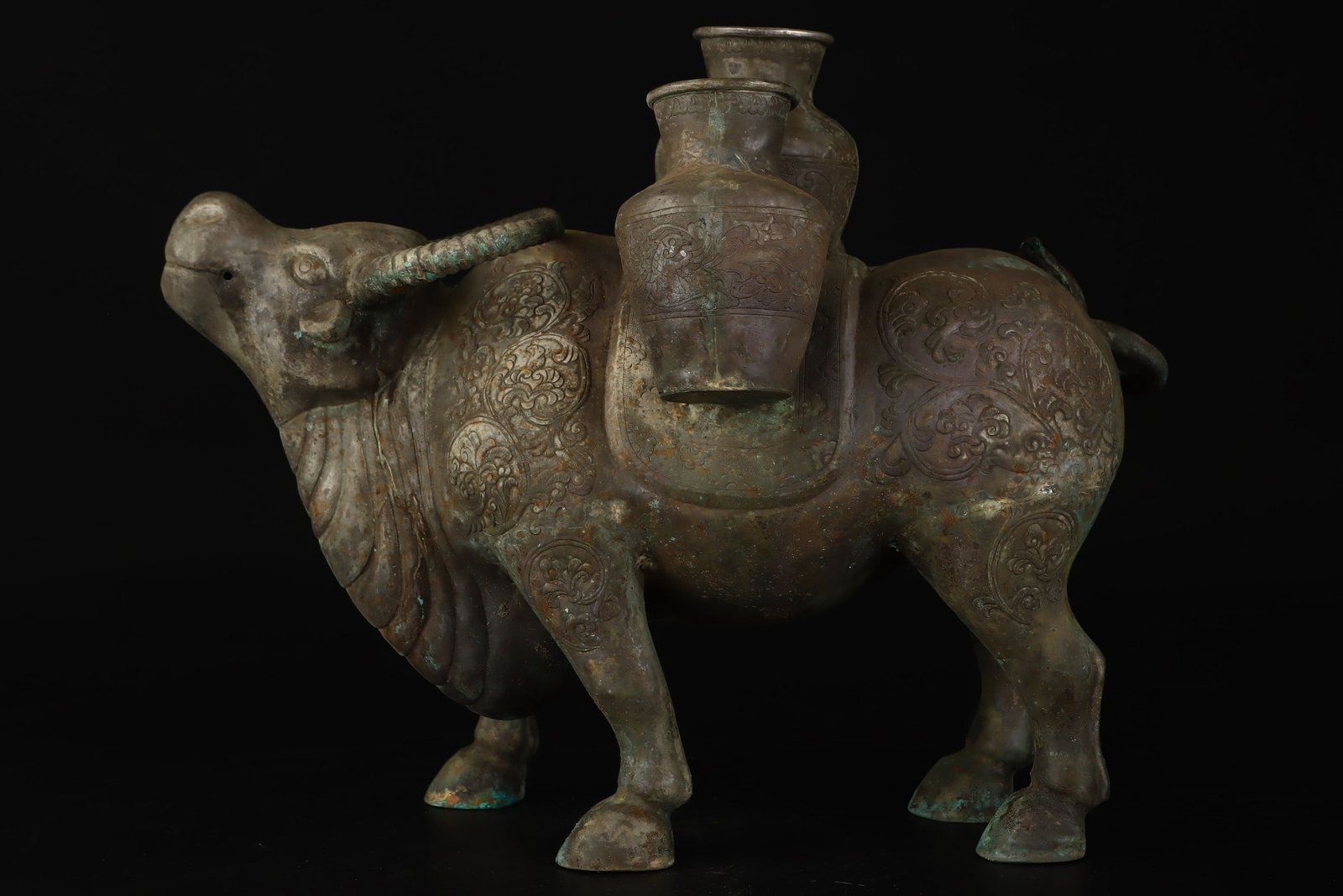 An Exquisite Bronze Silver-Inlaid Buffalo Ornament: An Exquisite Bronze Silver-Inlaid Buffalo Ornament,Ancient Time,China,Size:13inx10.6in,Weight:1404g 青铜错银牛摆件,远古时期