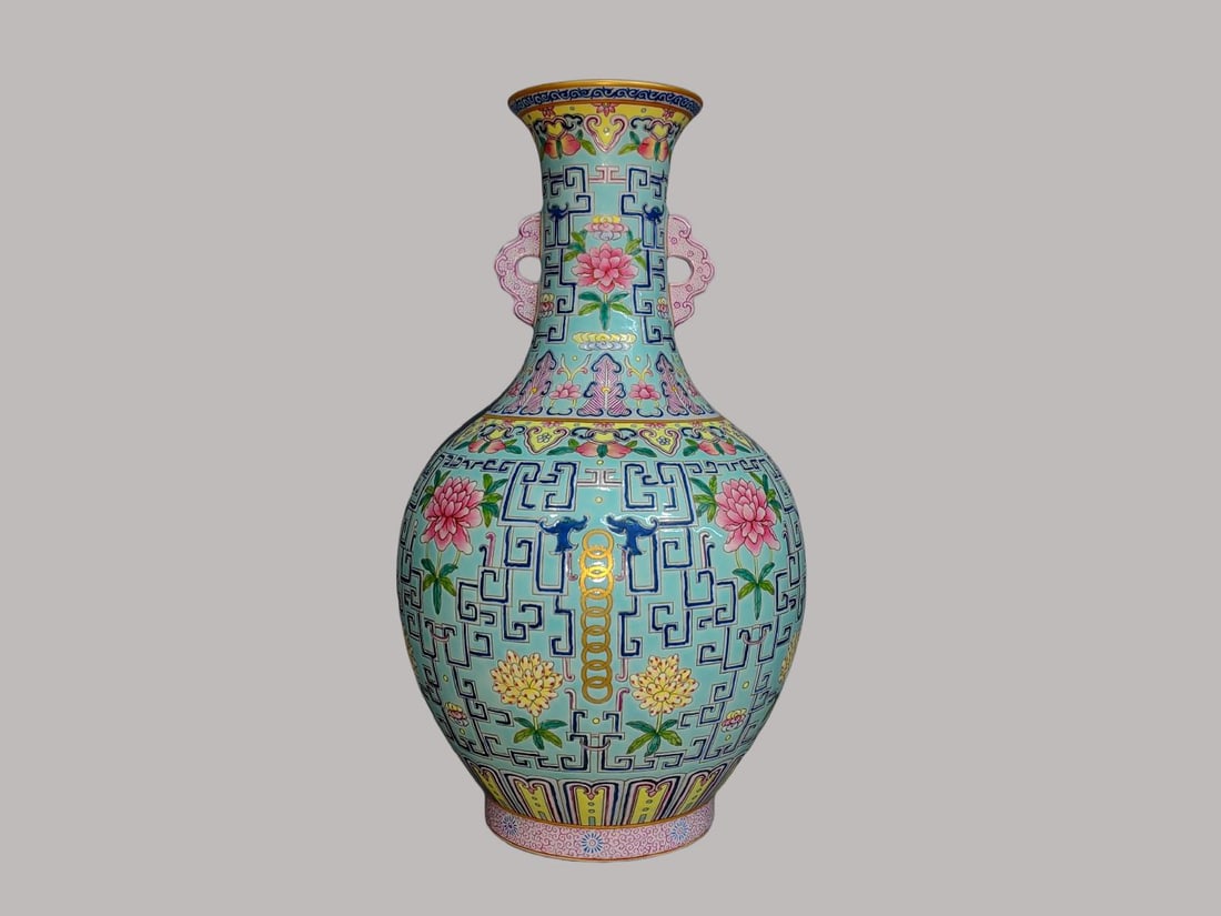 An Exquisite Turquoise-Glazed Green Ground Famille-Rose Flower Pattern Double-Ears Vase: An Exquisite Turquoise-Glazed Green Ground Famille-Rose Flower Pattern Double-Ears Vase,Qing Dynasty, China,Qianlong Six-character Mark,Size:13inx3.3inx6.7in 松石绿地粉&#