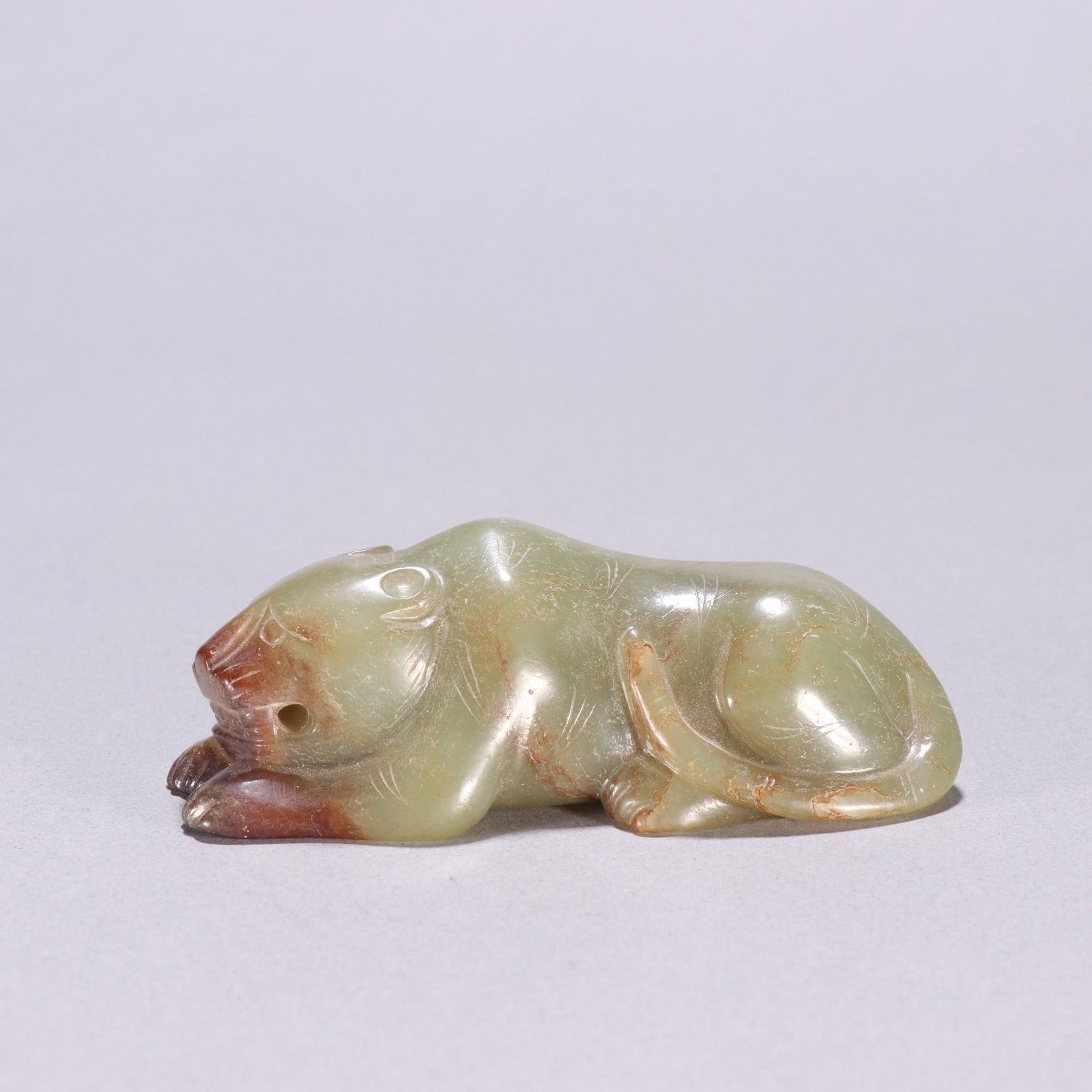 An Exquisite Hotan Jade Auspicious Beast Ornament: An Exquisite Hotan Jade Auspicious Beast Ornament, Han Dynasty, China,Size:1.1inx3.3in ,Weight:123.4g 和田玉瑞兽摆件, 中国汉代