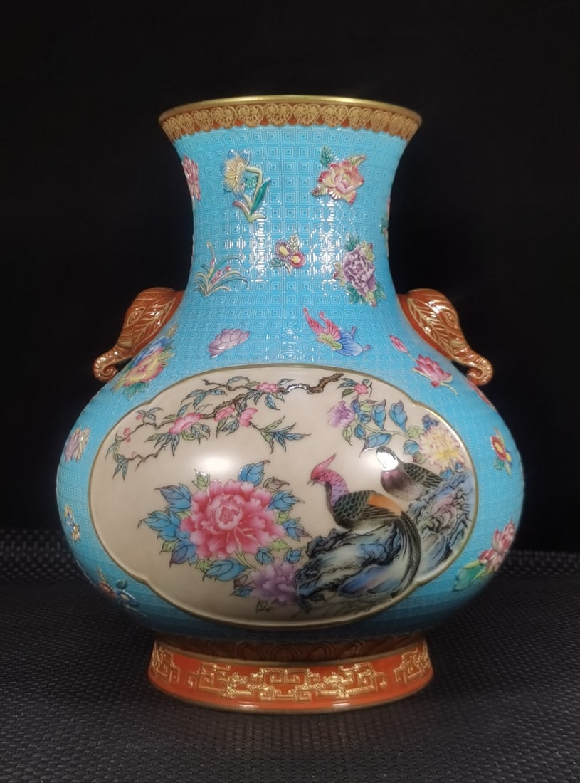 An Exquisite Enamel Blue Ground Flower and Bird Pattern Elephant-Ears Vase: An Exquisite Enamel Blue Ground Flower and Bird Pattern Elephant-Ears Vase,Qing Dynasty, China,Qianlong Six-character Mark,Size:11.4inx9.4in 珐琅彩蓝地花鸟