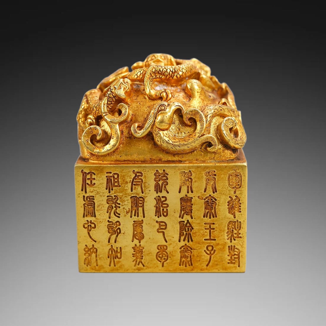 An Exquisite Gilt Bronze Dragon Seal: An Exquisite Gilt Bronze Dragon Seal,Qing Dynasty, China,Size:3.4inx2.4in ,Weight:1468g 铜鎏金龙印章,中国清代