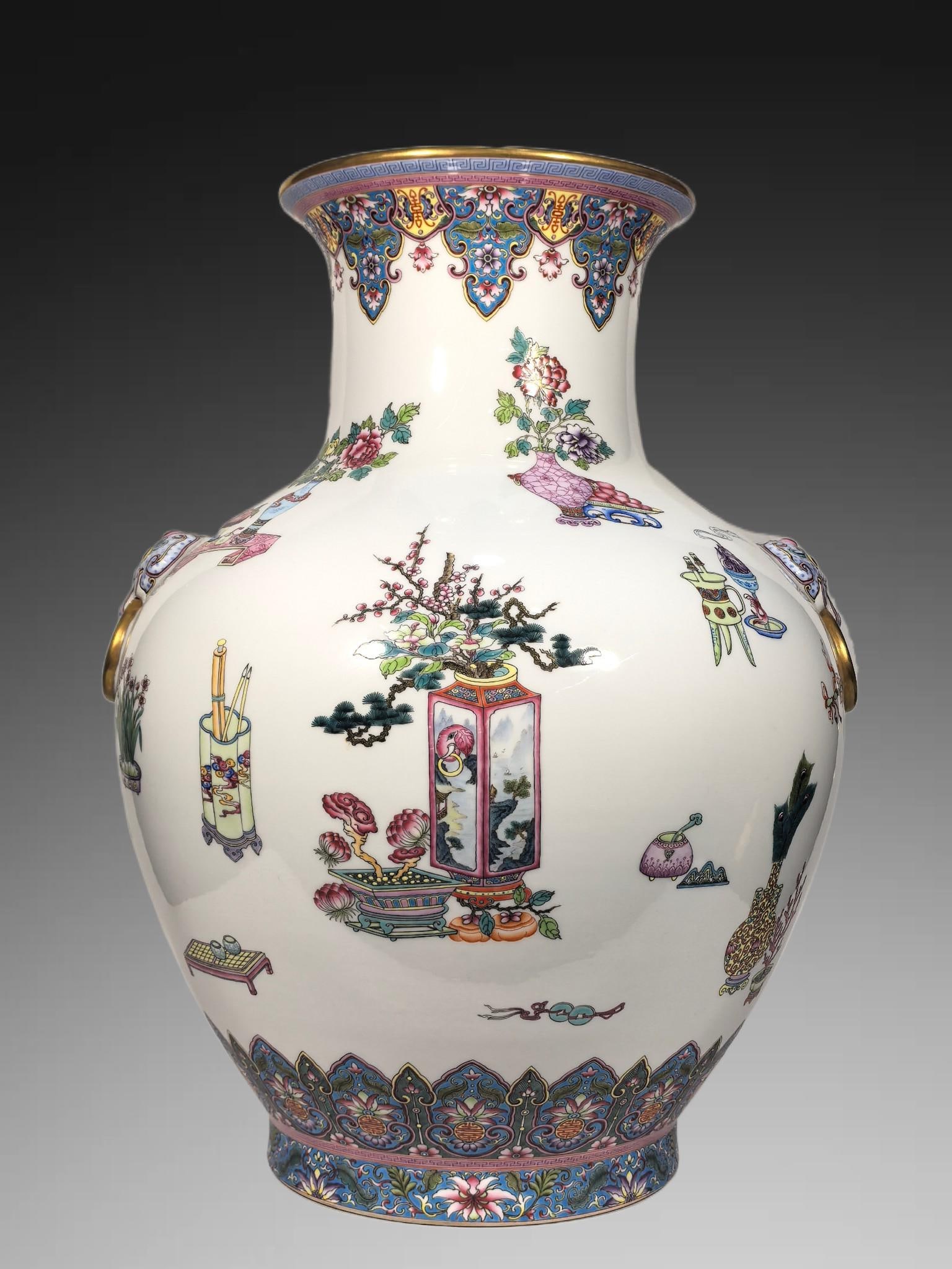 An Exquisite Famille-Rose Antique Treasures Pattern Lion-Ears Vase: An Exquisite Famille-Rose Antique Treasures Pattern Lion-Ears Vase,Qing Dynasty, China,Qianlong Four-character Mark,Size:20.9inx8.7inx15inx8.3in 粉彩博古纹狮耳
