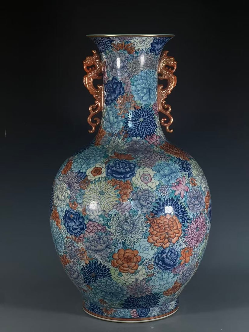 An Exquisite Famille-Rose Flower Pattern Dragon-Ears Vase: An Exquisite Famille-Rose Flower Pattern Dragon-Ears Vase,Qing Dynasty, China,Qianlong Six-character Mark,Size:27.8inx8.6inx9.9in 粉彩花卉纹龙耳瓶,È
