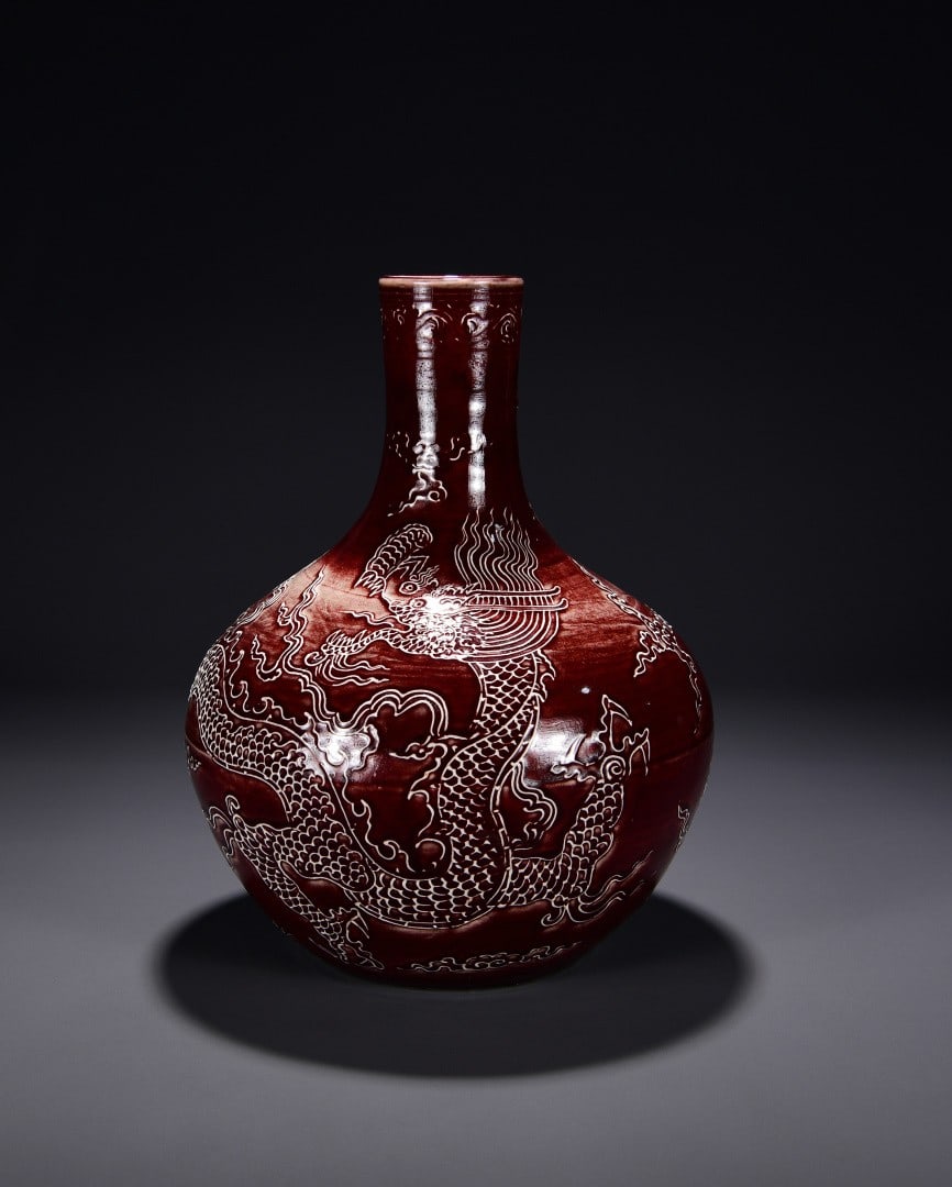 An Exquisite Ji Red Glazed Raised Powder Dragon Pattern Vase: An Exquisite Ji Red Glazed Raised Powder Dragon Pattern Vase,Ming Dynasty, China,Size:16.5inx12.2in 霁红釉沥粉龙纹瓶,中国明代