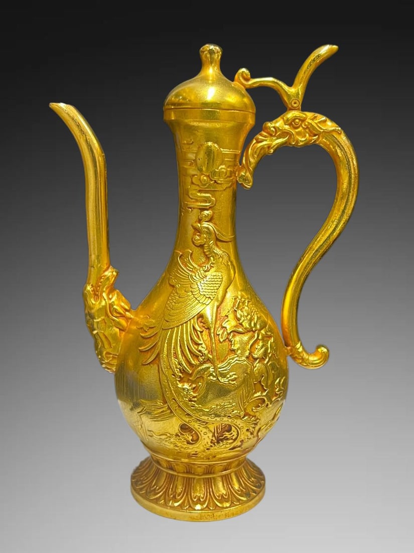 An Exquisite Gilt Bronze Dragon and Phoenix Pattern Ewer: An Exquisite Gilt Bronze Dragon and Phoenix Pattern Ewer,Qing Dynasty, China,Qianlong Four-character Mark,Size:9.6in