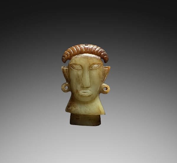 An Exquisite Hotan Jade Human Face Head Ornament: An Exquisite Hotan Jade Human Face Head Ornament,Ancient Time, China,Size:2.2in,Weight:31.3g 和田玉人面首摆件,远古时期