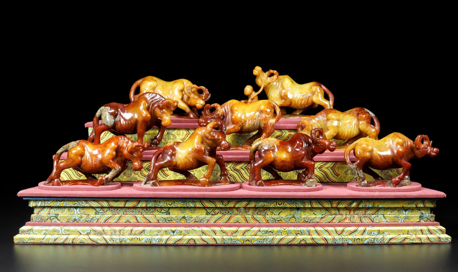 A Set of Exquisite Hotan Jade Buffalo Ornament: A Set of Exquisite Hotan Jade Buffalo Ornament,Han Dynasty, China,Size:7.9inx2.4inx3.9in(Single),29.1inx11.8inx11.4in(Whole) ,Weight:6700g(Without Base) 一套和田玉牛