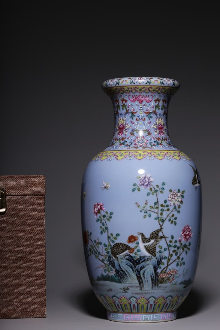 An Exquisite Famille-Rose Flower and Bird Pattern Vase: An Exquisite Famille-Rose Flower and Bird Pattern Vase,Qing Dynasty, China,Qianlong Six-character Mark,Size:13.7inx6.9inx3.9in