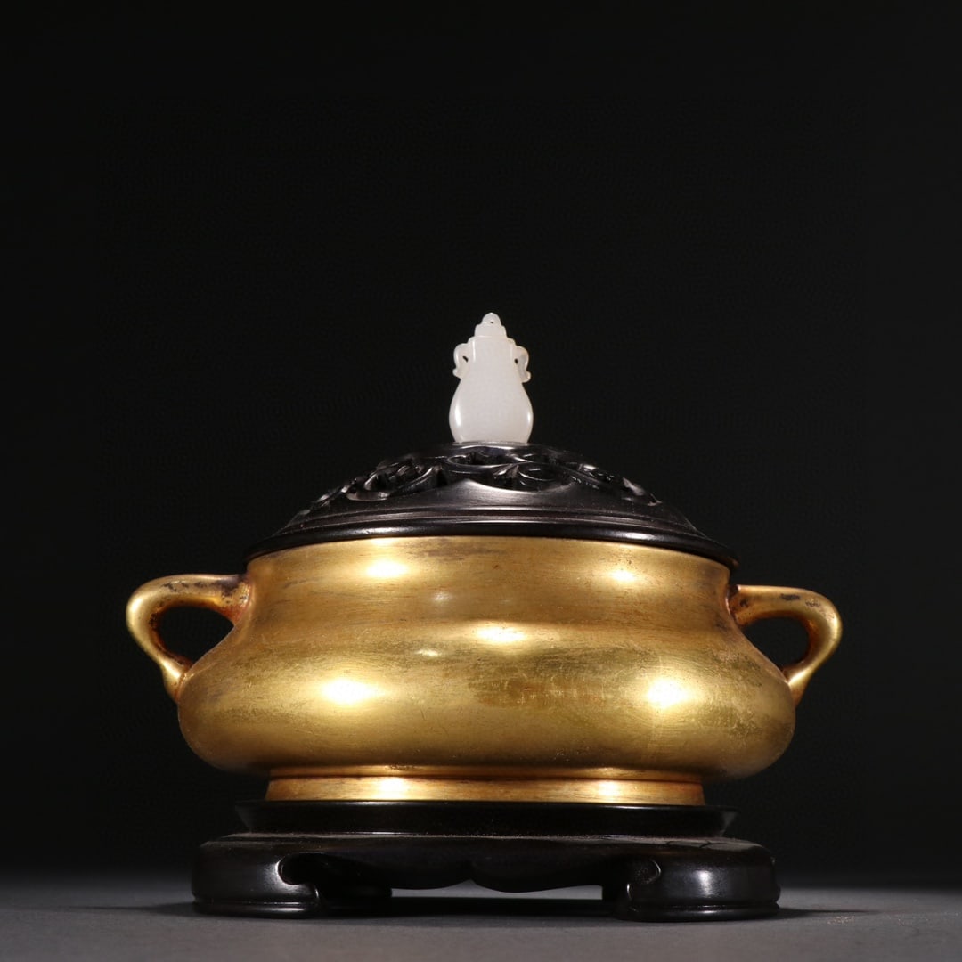 An Exquisite Gilt Bronze Double Ears Censer: An Exquisite Gilt Bronze Double Ears Censer,Ming Dynasty, China,Xuande Six-character Mark,Size:5.1inx6.3in ,Weight:1489g