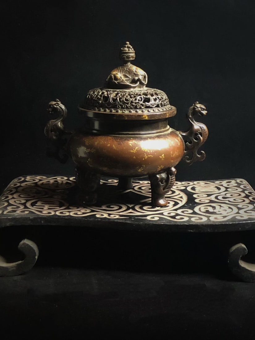 An Exquisite Copper Gold-Splashed Elephant Leg Dragon-Ears Censer: An Exquisite Copper Gold-Splashed Elephant Leg Dragon-Ears Censer,Ming Dynasty, China,Xuande Four-character Mark,Size:8.7inx5.1inx8.1inx4.5in ,Weight:3500g 紫铜洒金象$