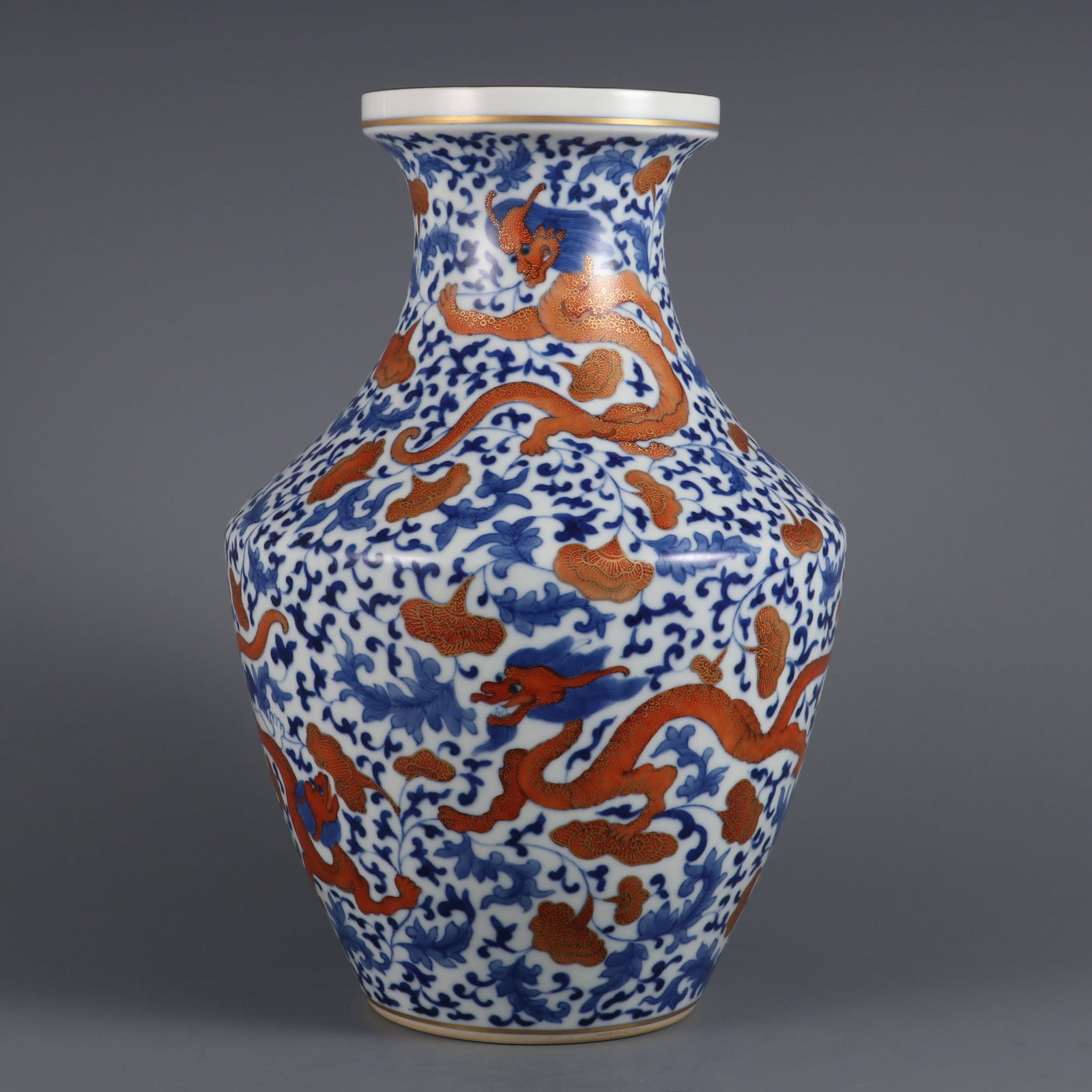 An Exquisite Blue and White Iron-Red Painted Gold Dragon Pattern Vase: An Exquisite Blue and White Iron-Red Painted Gold Dragon Pattern Vase,Qing Dynasty, China,Qianlong Six-character Mark,Size:11.7inx4.4inx7.5in 青花矾红描金龙&#