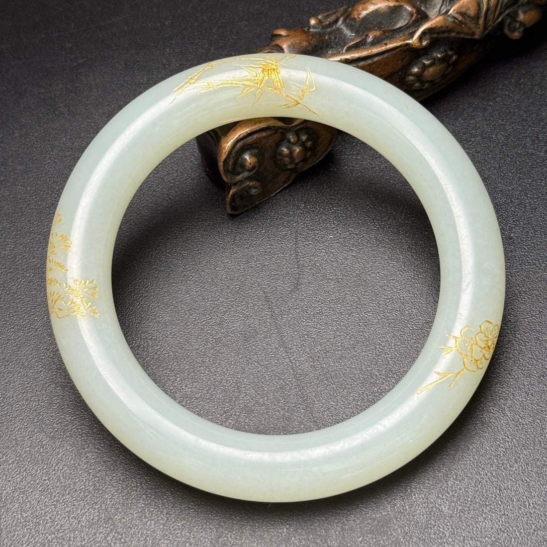 An Exquisite Hotan Jade Painted Gold Plum Flower Pattern Bracelets: An Exquisite Hotan Jade Painted Gold Plum Flower Pattern Bracelets,Qing Dynasty, China,Size:3.1in(Outer)x2.2in(Inner)x0.5in,Weight:63g 和田玉描金梅纹手&
