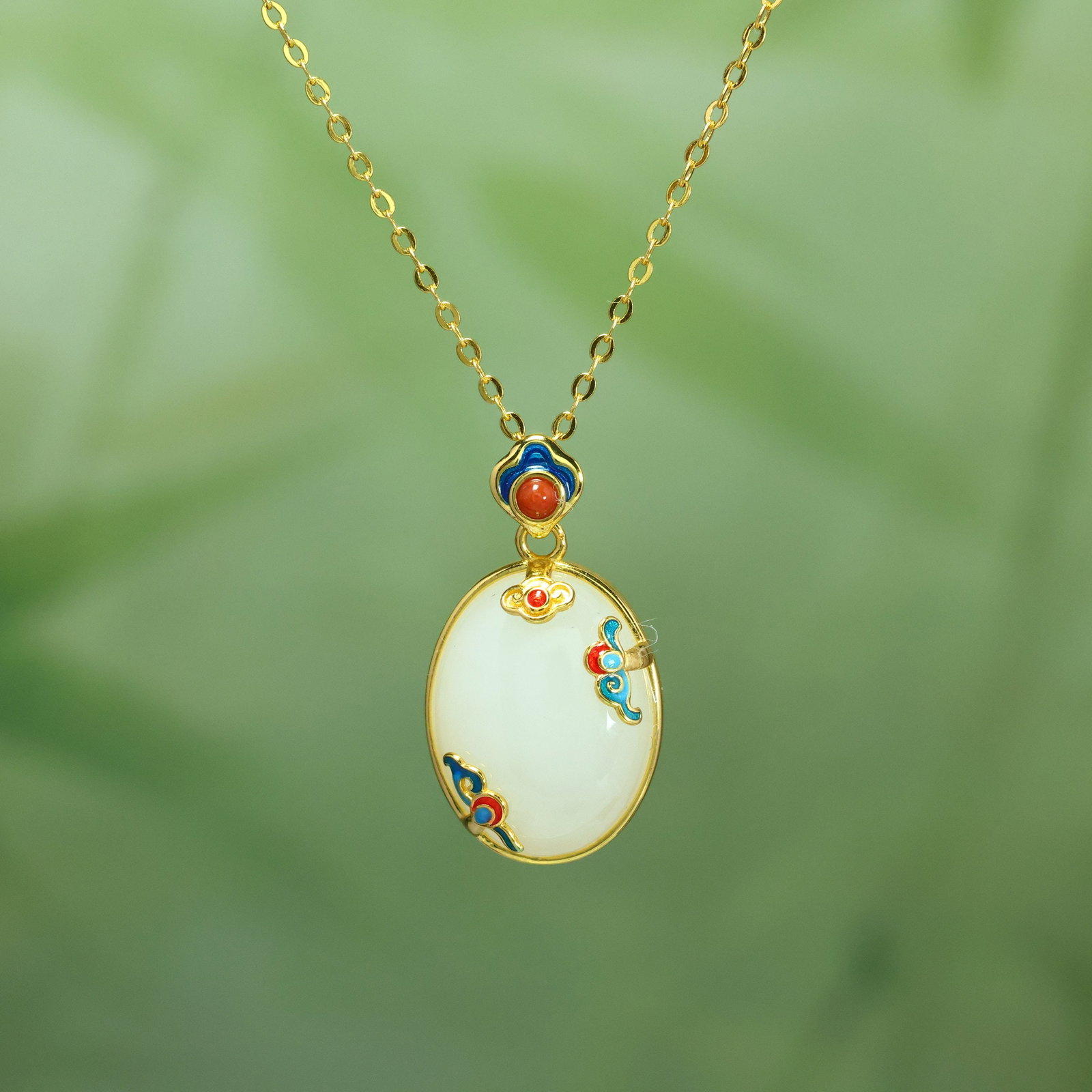 A Exquisite Silver Inlaid Hotan Jade Cabochon Pendant: A Exquisite Silver Inlaid Hotan Jade Cabochon Pendant,Size:0.5inx0.6in 银镶和田玉蛋面吊坠