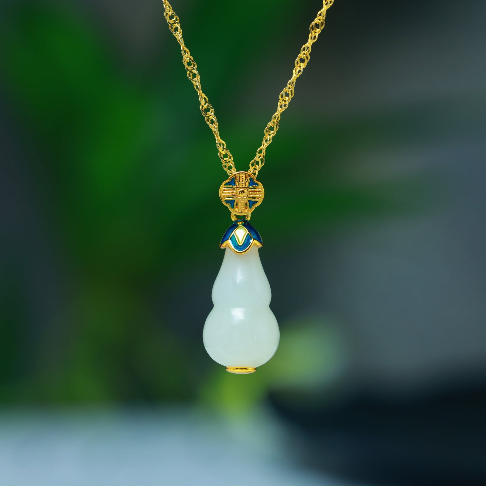 A Exquisite Silver Inlaid Hotan Jade Gourd Pendant: A Exquisite Silver Inlaid Hotan Jade Gourd Pendant,Size:0.4inx0.6in 银镶和田玉葫芦吊坠