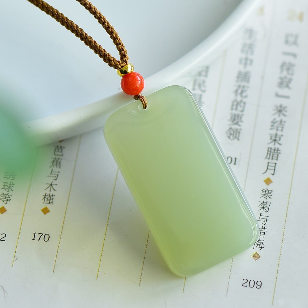 A Exquisite Hotan Jade Pendant: A Exquisite Hotan Jade Pendant,Size:1.6inx0.9in 和田玉平安无事牌