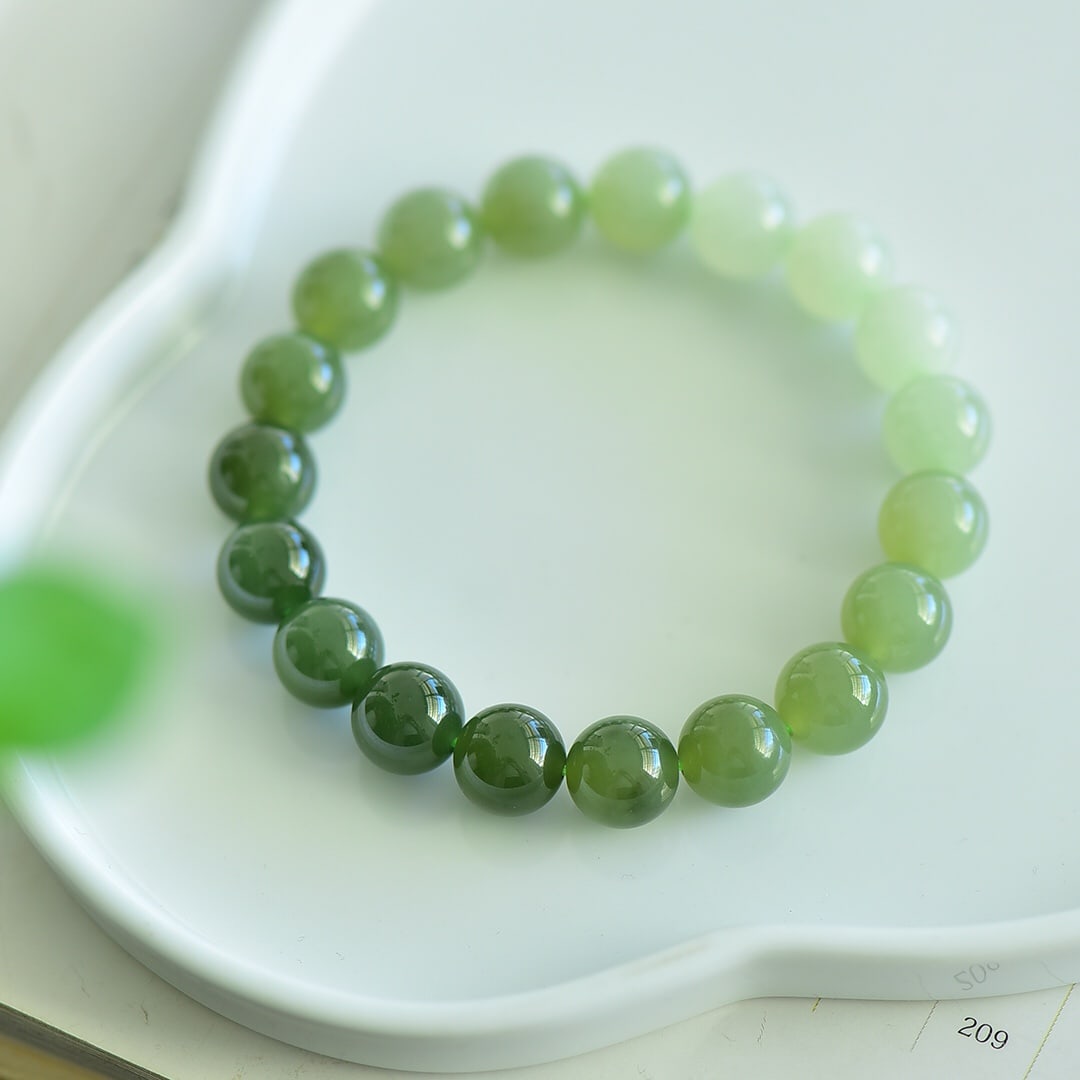 A Exquisite Hotan Jade Multi-Gem Bracelet: A Exquisite Hotan Jade Multi-Gem Bracelet,Size:0.4inx0.4in 和田玉多宝手链