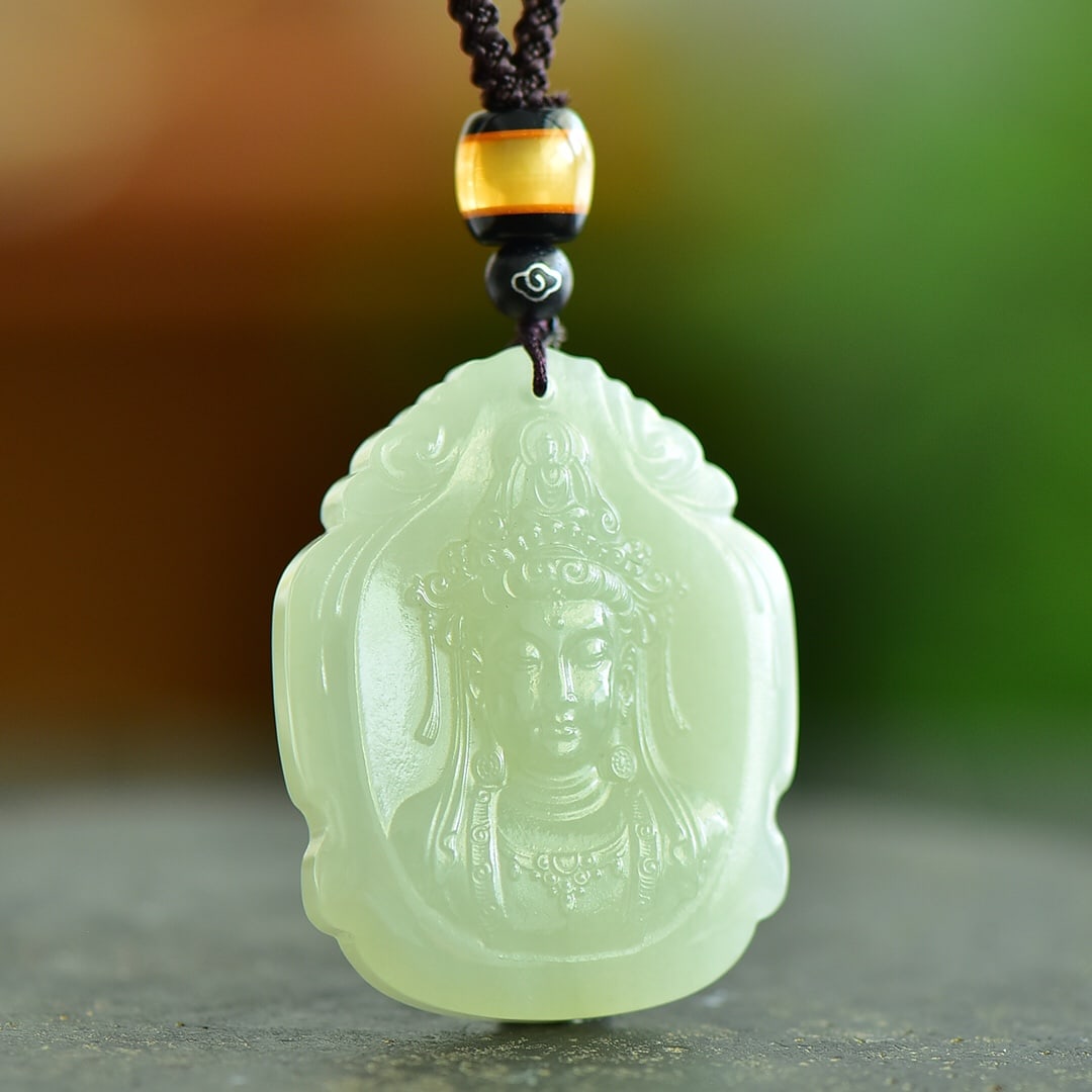 A Exquisite Hotan Jade Avalokitesvara Pendant: A Exquisite Hotan Jade Avalokitesvara Pendant,Size:2.2inx1.5in 和田玉观音吊坠