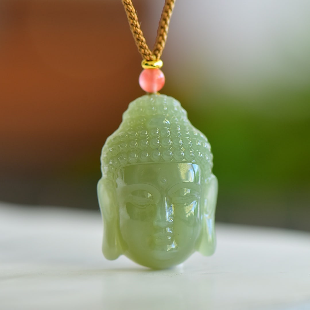 A Exquisite Hotan Jade Buddha Head Pendant: A Exquisite Hotan Jade Buddha Head Pendant,Size:1.3inx0.9in 和田玉佛首吊坠