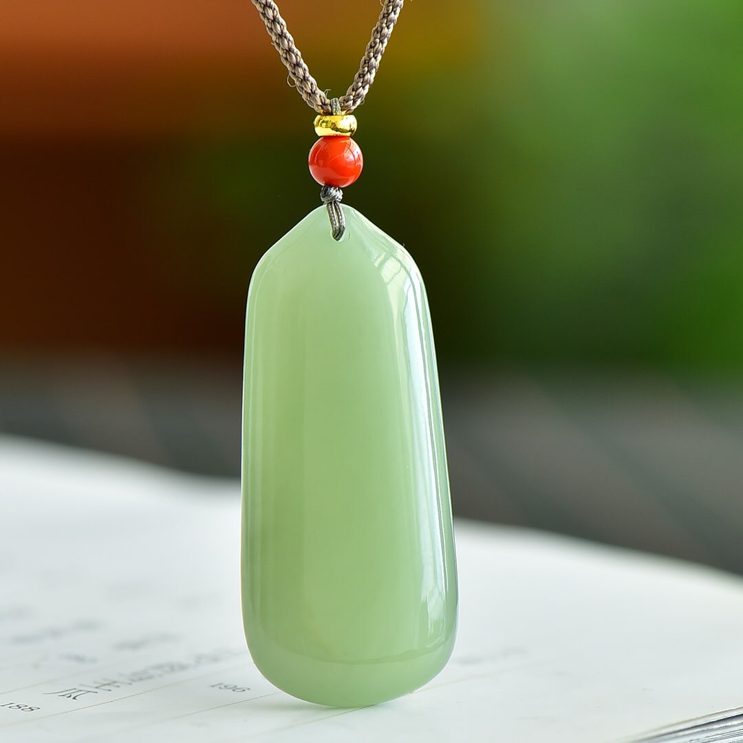 A Exquisite Hotan Jade Pendant: A Exquisite Hotan Jade Pendant,Size:1.9inx0.8in 和田玉平安无事牌