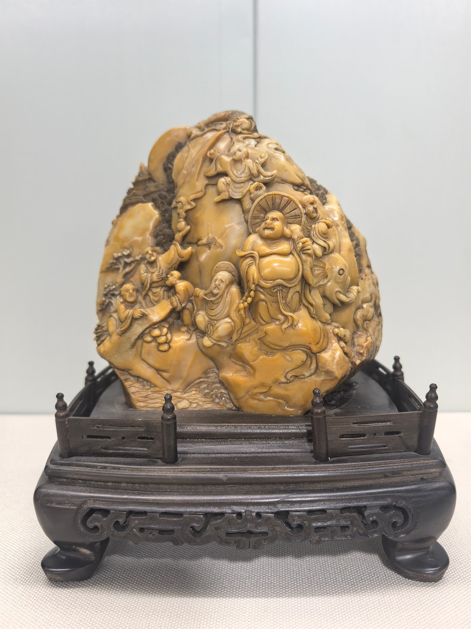An Exquisite Tianhuang Stone Landscape and Figure Pattern Ornament: An Exquisite Tianhuang Stone Landscape and Figure Pattern Ornament,Qing Dynasty,China,Size:7.5inx5.3in,田黄石山水人物纹摆件,中国