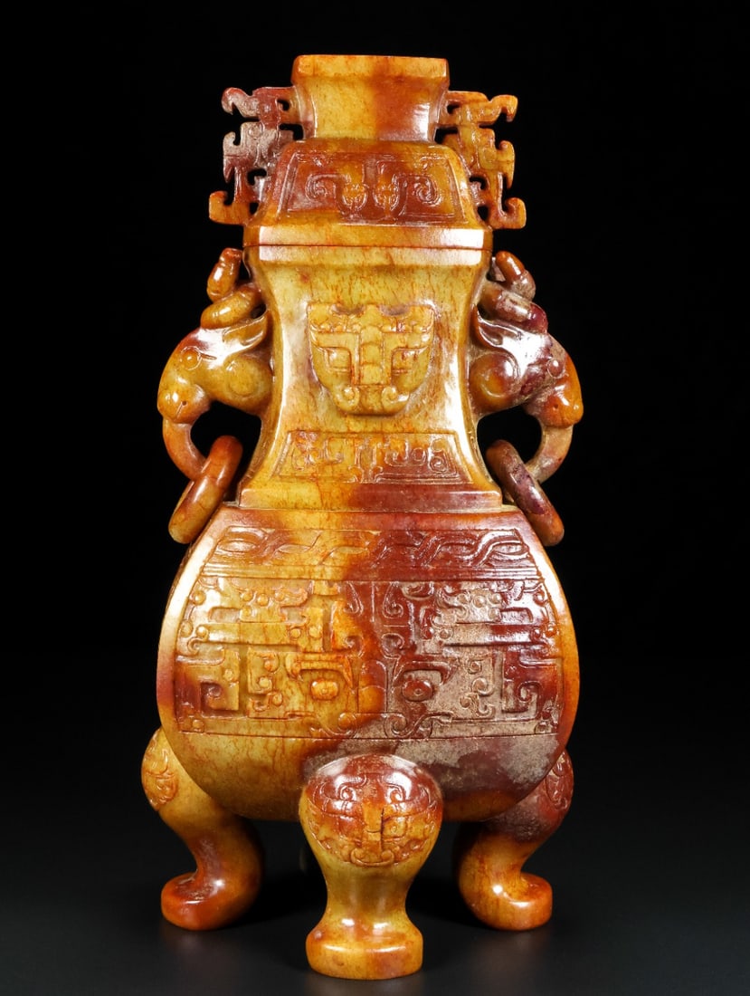 An Exquisite White Jade Beast-Face Pattern with Cover Elephant-Ears Vase: An Exquisite White Jade Beast-Face Pattern with Cover Elephant-Ears Vase,Han Dynasty,China,Size:5.1inx4.7inx10.2in,Weight:2191g,白玉兽面纹带盖象耳