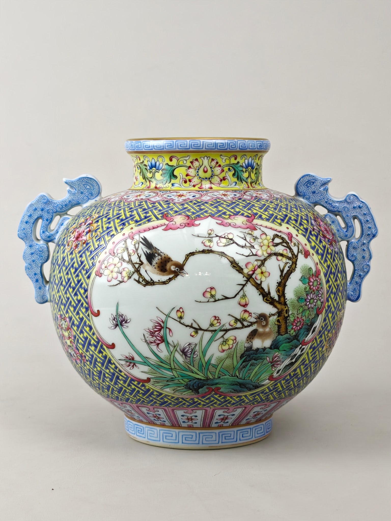 Famille-Rose Flower and Bird Pattern Double-Ears Vase: Famille-Rose Flower and Bird Pattern Double-Ears Vase,Qing Dynasty,China,with Qianlong Six-character Mark,Size:7.5inx9.1in 粉彩花鸟纹双耳瓶,中